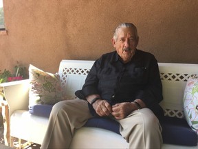In this Aug. 31, 2017 photo former U.S. Sen. Fred Harris of Oklahoma sits at his Corrales, N.M. home and discusses the 50th anniversary of the Kerner Commission, a panel appointed by President Lyndon Johnson in 1967 to examine the causes of the 1960s riots. Harris is the last surviving member of the Kerner Commission and he says he remains haunted that its recommendations on U.S. race relations and poverty were never adopted. (AP Photo/Russell Contreras)