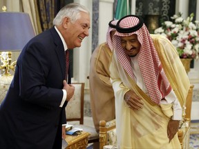 Secretary of State Rex Tillerson and Saudi King Salman speak before their meeting, Sunday, Oct. 22, 2017, in Riyadh, Saudi Arabia. (AP Photo/Alex Brandon, Pool)