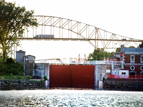 The Canadian Sault Lock in the foreground as a transport truck makes its way over the Sault Ste. Marie International Bridge. The small twin border cities of Sault Ste. Marie, in Ontario and Michigan, are bidding for Amazon’s second headquarters.