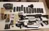 The cache of weapons police found in Scott Edmisten’s car during a traffic stop.