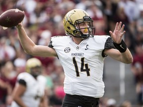 Vanderbilt quarterback Kyle Shurmur (14) attempts a pass against South Carolina during the first half of an NCAA college football game Saturday, Oct. 28, 2017, in Columbia, S.C. (AP Photo/Sean Rayford)