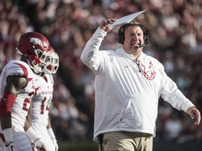 Arkansas head coach Bret Bielema watches from the sideline during the first half of an NCAA college football game against South Carolina on Saturday, Oct. 7, 2017, in Columbia, S.C. (AP Photo/Sean Rayford)