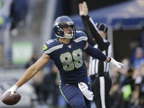 Seattle Seahawks tight end Jimmy Graham celebrates after he scored a touchdown against the Houston Texans in the second half of an NFL football game, Sunday, Oct. 29, 2017, in Seattle. It was Graham's second touchdown in the second half and the Seahawks won 41-38. (AP Photo/Stephen Brashear)