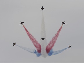 South Korean Air Force's Black Eagles aerobatic team performs during the press day of the 2017 Seoul International Aerospace and Defense Exhibition at Seoul Airport in Seongnam, South Korea, Monday, Oct. 16, 2017. South Korean and U.S. troops launched five days of naval drills on Monday, three days after North Korea renewed its threat to fire missiles near the American territory of Guam. (AP Photo/Ahn Young-joon)