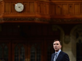 Minister of Finance Bill Morneau stands during question period in the House of Commons on Parliament Hill in Ottawa on Monday, Oct. 23, 2017. THE CANADIAN PRESS/Sean Kilpatrick