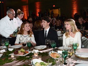 Prime Minister Justin Trudeau, wife Sophie Gregoire Trudeau and Ivanka Trump look on during the Fortune Most Powerful Women Summit and Gala in Washington, D.C., on Tuesday, Oct. 10, 2017. THE CANADIAN PRESS/Sean Kilpatrick