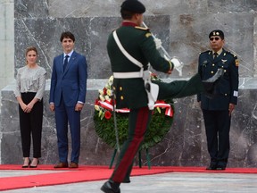 Prime Minister Justin Trudeau and his wife Sophie Gregoire Trudeau attend a wreath-laying ceremony at the Ninos Heroes monument in Mexico City's Chapultepec Park, Thursday, Oct. 12, 2017. THE CANADIAN PRESS/Sean Kilpatrick