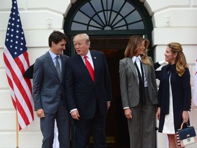 Prime Minister Justin Trudeau and his wife Sophie Gregoire Trudeau are welcomed to the White House by U.S. President Donald Trump and his wife Melania in Washington, D.C. on Wednesday, Oct. 11, 2017.