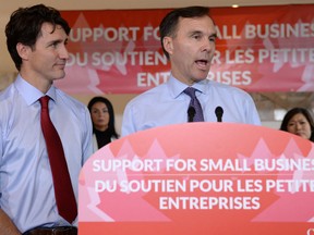 Finance Minister Bill Morneau with Prime Minister Justin Trudeau at a press conference on tax reforms in Stouffville, Ont.