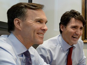 Finance Minister Bill Morneau and Prime Minister Justin Trudeau at Pastaggio Italian Eatery, in Whitchurch-Stouffville, Ont., on Monday, October 16, 2017.