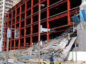 Scaffolding is collapsed after a strong wind brought by a powerful typhoon, at a hospital in Fukuoka, southern Japan Monday, Oct. 23, 2017.  (Yoichi Ishikawa/Kyodo news via AP)