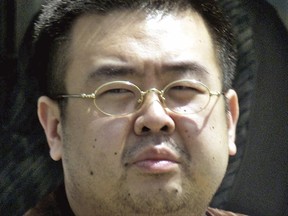 FILE - This May 4, 2001, file photo shows Kim Jong Nam, exiled half brother of North Korea's leader Kim Jong Un, in Narita, Japan. The trial of two women accused of poisoning the estranged half brother of North Korea's ruler is scheduled to begin Monday, Oct. 2, 2017, in Malaysia's High Court, nearly eight months after the brazen airport assassination. Siti Aisyah of Indonesia and Doan Thi Huong of Vietnam are suspected of smearing Kim Jong Nam's face with the banned VX nerve agent on Feb. 13 at a crowded airport terminal in Kuala Lumpur, killing him within about 20 minutes. The women say they thought they were playing a harmless prank for a hidden-camera show.(AP Photo/Shizuo Kambayashi, File)