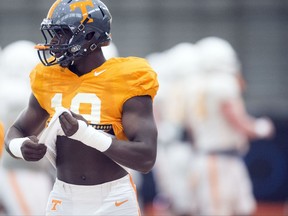 FILE - In this April 7, 2016, file photo, Tennessee defensive lineman Darrell Taylor (19) attends NCAA college football practice in Knoxville, Tenn. Tennessee has suspended starting defensive end Darrell Taylor indefinitely, the latest adversity for a team that has dropped its first two Southeastern Conference games and is coming off its most lopsided home loss since 1905. Volunteers coach Butch Jones said Monday, Oct. 9, 2017, that "multiple factors" had led to Taylor's suspension. (Saul Young/Knoxville News Sentinel via AP, File)