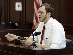 Robert Engle testifies during a preliminary hearing for Emanuel Kidega Samson in general sessions court Monday, Oct. 23, 2017, in Nashville, Tenn. Samson is accused of fatally shooting one person and wounding others at a Tennessee church on September. Engle, a congregation member, said he confronted Samson inside the church after Samson entered the sanctuary and began firing. The case against Samson was bound over to a grand jury. Samson did not appear at the hearing. (AP Photo/Mark Humphrey)
