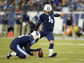 Tennessee Titans kicker Ryan Succop (4) kicks a 48-yard field goal as Brett Kern (6) holds in the first half of an NFL football game against the Indianapolis Colts Monday, Oct. 16, 2017, in Nashville, Tenn. (AP Photo/Mark Zaleski)