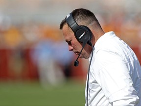 Tennessee head coach Butch Jones walks back to the sideline in the second half of an NCAA college football game against South Carolina Saturday, Oct. 14, 2017, in Knoxville, Tenn. South Carolina won 15-9. (AP Photo/Wade Payne)