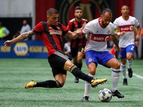 Toronto FC midfielder Victor Vazquez dribbles against Atlanta on Oct. 22.