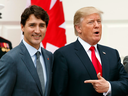 U.S. President Donald Trump points to Prime Minister Justin Trudeau as he welcomes him to the White House in Washington, D.C. on Wednesday, Oct. 11, 2017.