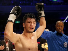 Japan's Ryota Murata cries as he is declared the winner after defeating France's Hassan N'Dam in their rematch for the WBA world middleweight boxing title in Tokyo, Sunday, Oct. 22, 2017. Murata became the middleweight world champion. (AP Photo/Toru Takahashi)