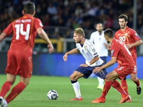 Italy's Ciro Immobile, center, controls the ball during a World Cup Group G qualifying soccer match between Italy and Macedonia in Turin, Italy, Friday,  Oct. 6, 2017. (Alessandro Di Marco/ANSA via AP)