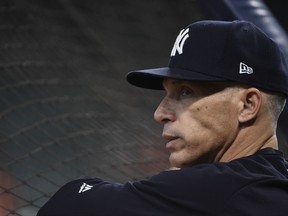 New York Yankees manager Joe Girardi watches batting practice before Game 7 of the American League Championship Series baseball game against the Houston Astros Saturday, Oct. 21, 2017, in Houston. (AP Photo/Eric Christian Smith)