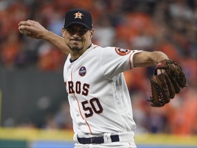 Houston Astros starting pitcher Charlie Morton throws during the first inning of Game 7 of baseball's American League Championship Series against the New York Yankees Saturday, Oct. 21, 2017, in Houston. (AP Photo/Eric Christian Smith)