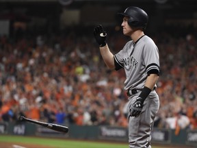 New York Yankees' Todd Frazier tosses his bat after striking out during the fifth inning of Game 6 of baseball's American League Championship Series against the Houston Astros Friday, Oct. 20, 2017, in Houston. (AP Photo/Eric Christian Smith)