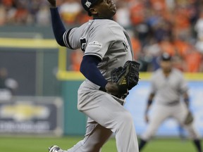 New York Yankees relief pitcher Aroldis Chapman throws during the ninth inning of Game 2 of baseball's American League Championship Series against the Houston Astros Saturday, Oct. 14, 2017, in Houston. (AP Photo/Tony Gutierrez)