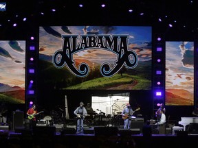 A sound check is conducted before a concert in College Station, Texas, Saturday, Oct. 21, 2017. All five living former U.S. presidents will be attending the concert Saturday night, raising money for relief efforts from hurricane devastation in Texas, Florida, Puerto Rico and the U.S. Virgin Islands.  (AP Photo/LM Otero)