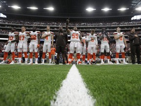 The Cleveland Browns stand during the playing of the national anthem before an NFL football game against the Houston Texans on Sunday, Oct. 15, 2017, in Houston. (AP Photo/Eric Gay)