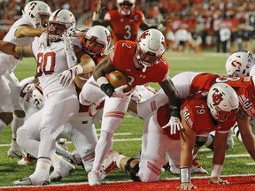 Utah running back Zack Moss (2) scores against Stanford in the first half during an NCAA college football game Saturday, Oct. 7, 2017, in Salt Lake City. (AP Photo/Rick Bowmer)