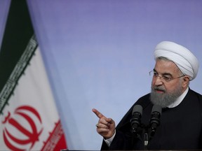 Iran's President Hassan Rouhani speaks during a ceremony
