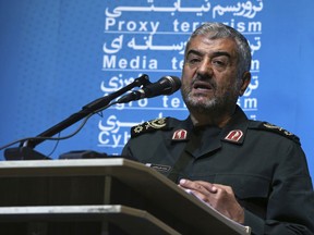 The head of Iran's paramilitary Revolutionary Guard Gen. Mohammad Ali Jafari speaks in a conference called "A World Without Terror," in Tehran, Iran, Tuesday, Oct. 31, 2017. Jafari said Tuesday that the country's supreme leader has limited the range of ballistic missiles it makes to 2,000 kilometers, or 1,240 miles. (AP Photo/Vahid Salemi)