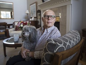 Max Morton, 81, sits with his dog Barney at his home in Richmond, B.C., on Monday October 30, 2017. Morton is one of 411 patients who had transcatheter aortic valve replacement surgery where the damaged aortic valve is replaced without removing the old one. The procedure is an alternative to the more invasive open-heart surgery. THE CANADIAN PRESS/Darryl Dyck