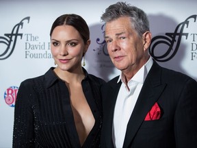 Katharine McPhee and David Foster arrive for the David Foster Foundation 30th Anniversary Miracle Gala, in Vancouver, B.C., on Saturday October 21, 2017. Foster didn't expect to encounter Donald Trump while playing a fundraiser at his Florida estate earlier this year, but he wishes he'd offered the U.S. president a shred of advice. THE CANADIAN PRESS/Darryl Dyck