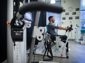 Brad Skeats, who has a spinal cord injury, works out at the Physical Activity Research Centre at the International Collaboration on Repair Discoveries, in Vancouver, B.C., on Wednesday October 25, 2017. People with spinal cord injuries now have a set of exercise guidelines for maintaining heart health to match those offered to the general population decades ago. THE CANADIAN PRESS/Darryl Dyck
