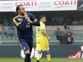 Hellas Verona's Giampaolo Pazzini celebrates after scoring on a penalty during a Serie A soccer match between Chievo Verona and Hellas Verona, at the Bentegodi stadium in Verona, Italy, Sunday, Oct. 22, 2017. (Filippo Venezia/ANSA via AP)