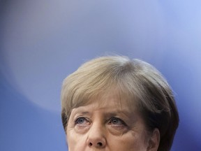 German Chancellor Angela Merkel speaks during a media conference at the conclusion of an EU summit in Brussels on Friday, Oct. 20, 2017. European Union leaders gathered Friday to weigh progress in negotiations on Britain's departure from their club as they look for new ways to speed up the painfully slow moving process. (AP Photo/Geert Vanden Wijngaert)