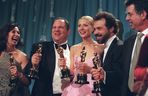  Harvey Weinstein, second from left, celebrates alongside the actress Gwynneth Paltrow and other producers of “Shakespeare in Love” after their film won the best picture Oscar, in Los Angeles, March 22, 1999.