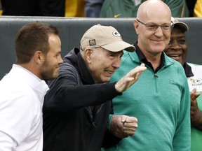 Former Green Bay Packers Hall of Fame quarterback Bart Starr waves to fans as he attends the 50th anniversary of Green Bay's 1967 championship team during the first half of NFL football game between the Green Bay Packers and the New Orleans Saints, Sunday, Oct. 22, 2017, in Green Bay, Wis. (AP Photo/Jeffrey Phelps)