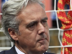 In this file photo dated Aug. 18, 2017, British International Trade Minister Mark Garnier, who has been caught up in the Westminster sexism storm.