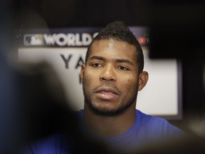 Los Angeles Dodgers right fielder Yasiel Puig talks during media day for baseball's World Series against the Houston Astros, Monday, Oct. 23, 2017, in Los Angeles. (AP Photo/David J. Phillip)