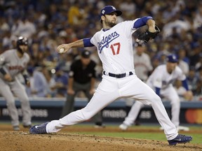 Los Angeles Dodgers relief pitcher Brandon Morrow throws against the Houston Astros during the seventh inning of Game 2 of baseball's World Series Wednesday, Oct. 25, 2017, in Los Angeles. (AP Photo/Matt Slocum)
