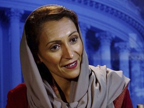 In this image from video, Fatimah Baeshen, the spokeswoman for the Saudi Arabia Embassy in Washington, speaks during an Associated Press interview.  As Saudi Arabia works feverishly to portray itself as ready to join the ranks of modern, tolerant societies, the kingdom has turned to a once-unimaginable face to make its case to the West: one of its daughters. (AP Photo)
