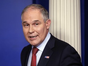 In this June 2, 2017 file photo, EPA Administrator Scott Pruitt looks back after speaking to the media during the daily briefing in the Brady Press Briefing Room of the White House in Washington.  Pruitt says he'll revive a Bush-era program to maintain an open dialogue with American businesses. Pruitt says the collaboration will boost the economy while delivering "better environmental outcomes."  (AP Photo/Pablo Martinez Monsivais)
