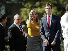 In this Oct. 2, 2017, photo, from second left, National Security Adviser H.R. McMaster, Ivanka Trump, the daughter and assistant to President Donald Trump, and White House Senior Adviser Jared Kushner, walk on the South Lawn of the White House in Washington. President Donald Trump and his Republican partners in a nearly $6 trillion tax-cutting plan insist it would benefit middle-class Americans and not the wealthy. But a key provision of the plan would slash tax rates for a special kind of business set up by owners of profitable firms, including Trump and his family. Instead of paying the current top rate of 39.6 percent, owners of these businesses would be taxed at 25 percent under the GOP plan. That would deliver a substantial windfall to Ivanka Trump and her husband, Jared Kushner, who have reported holding stakes in more than 200 limited liability companies. (AP Photo/Pablo Martinez Monsivais)
