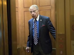 FILE - In this Sept. 7, 2017, file photo, Sen. Chuck Grassley, R-Iowa, arrives at the Capitol in Washington. Grassley said Oct. 17 he may seek to block President Donald Trump's nominees for key posts at the Environmental Protection Agency unless the administration backs off a proposed reduction in the volume of biofuels blended into gasoline and diesel. (AP Photo/J. Scott Applewhite, FIle)