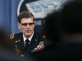 FILE - In this April 11, 2017, file photo, Gen. Joseph Votel speaks during a news conference with Defense Secretary Jim Mattis at the Pentagon. Votel, the top U.S. commander for the Middle East says American troops in Afghanistan have begun working with smaller Afghan units to prepare them for a more aggressive offensive against the Taliban next year in a push to break the stalemate in the 16-year-old war. (AP Photo/Carolyn Kaster, File)