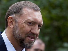 FILE - In this July 2, 2015, file photo, Russian metals magnate Oleg Deripaska attends Independence Day celebrations at Spaso House, the residence of the American Ambassador, in Moscow, Russia. A federal judge has dismissed a defamation lawsuit brought against The Associated Press by Russian billionaire Deripaska, who has ties to Russian President Vladimir Putin. (AP Photo/Alexander Zemlianichenko, File)