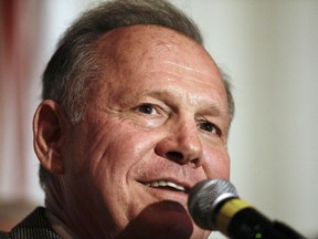 FILE - In this Sept. 26, 2017, file photo, former Alabama Chief Justice and U.S. Senate candidate Roy Moore speaks during his election party in Montgomery, Ala. Moore won the Alabama Republican primary runoff for U.S. Senate. Moore who bested President Donald Trump's pick to fill the state's Senate vacancy is visiting the capital on Oct. 5, 2017. (AP Photo/Brynn Anderson, File)